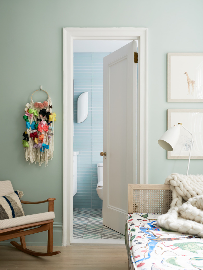 kids bedroom with green walls