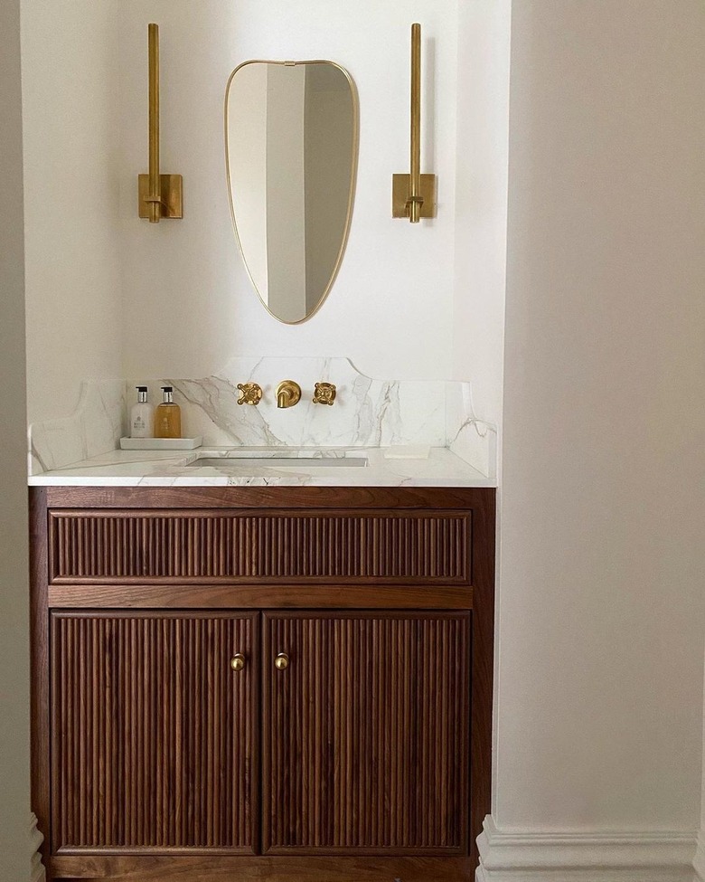 Small powder room with vintage mirror