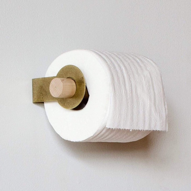 brass and wood toilet paper holder