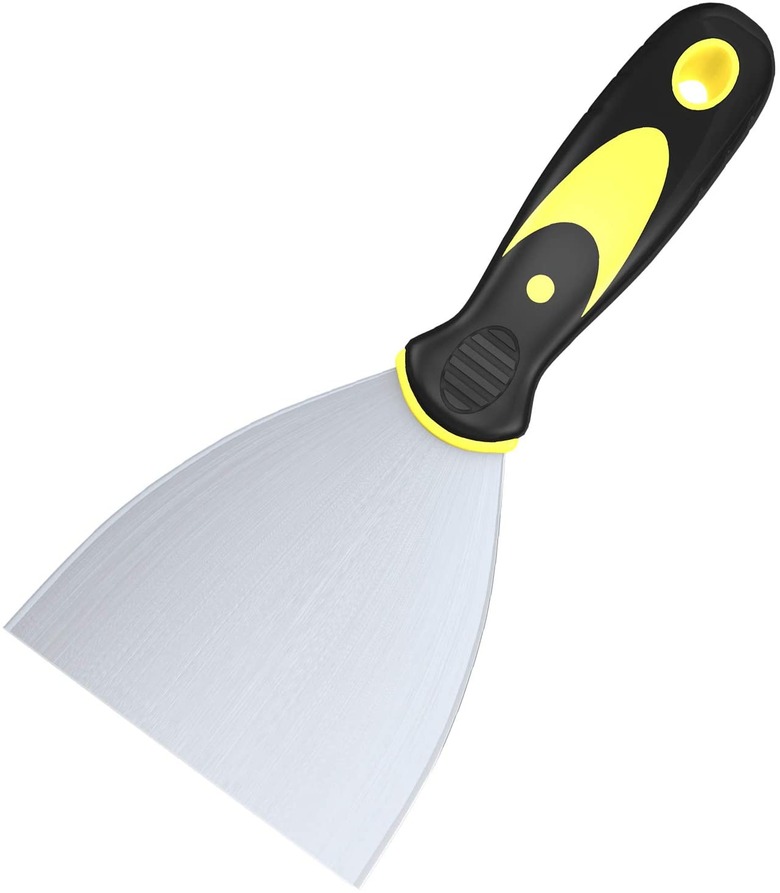 Putty knife with black and yellow handle