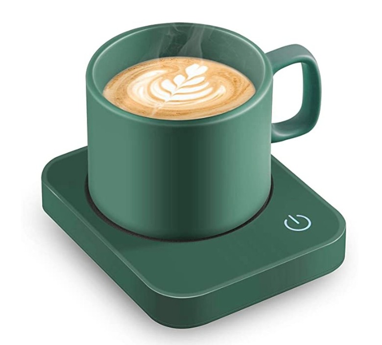 green mug and warming disc