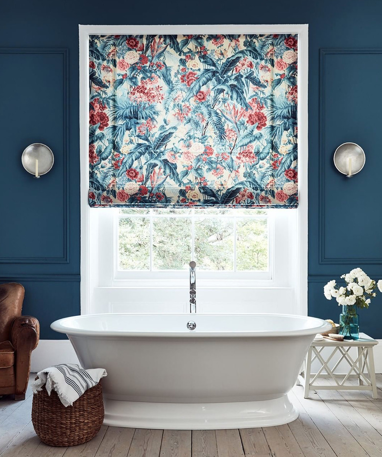 traditional bathroom idea with regal blue walls