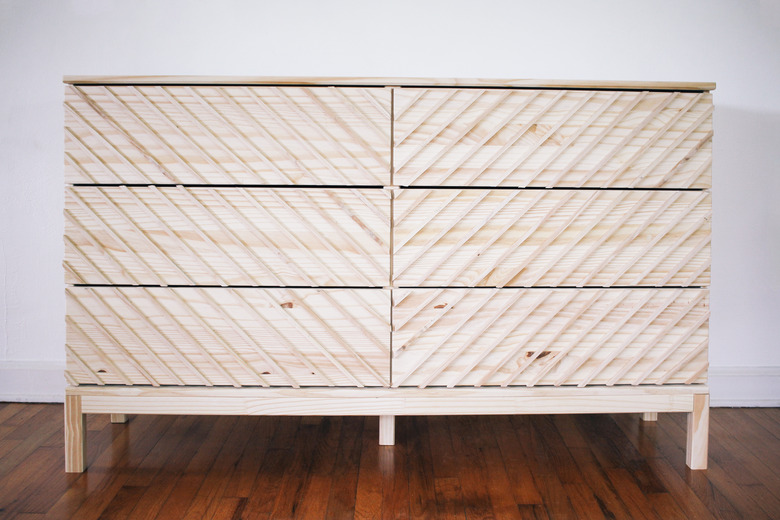 Dowels glued to all drawers in a V pattern