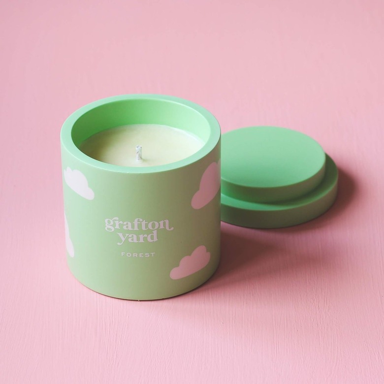 green candle with cloud pattern