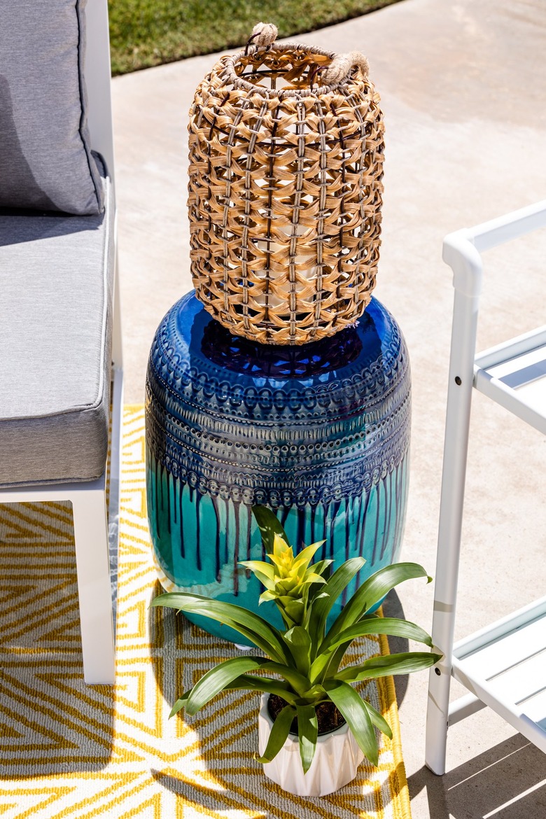 three planters near lounge area