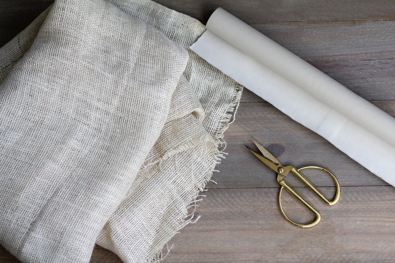 Burlap sheets with gold scissors