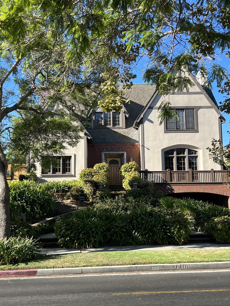 tan and brick Tudor home