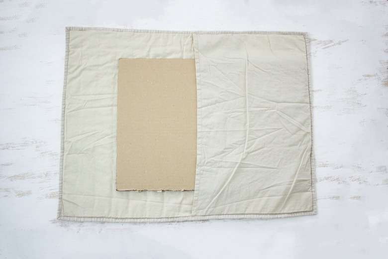 White fabric with cardboard