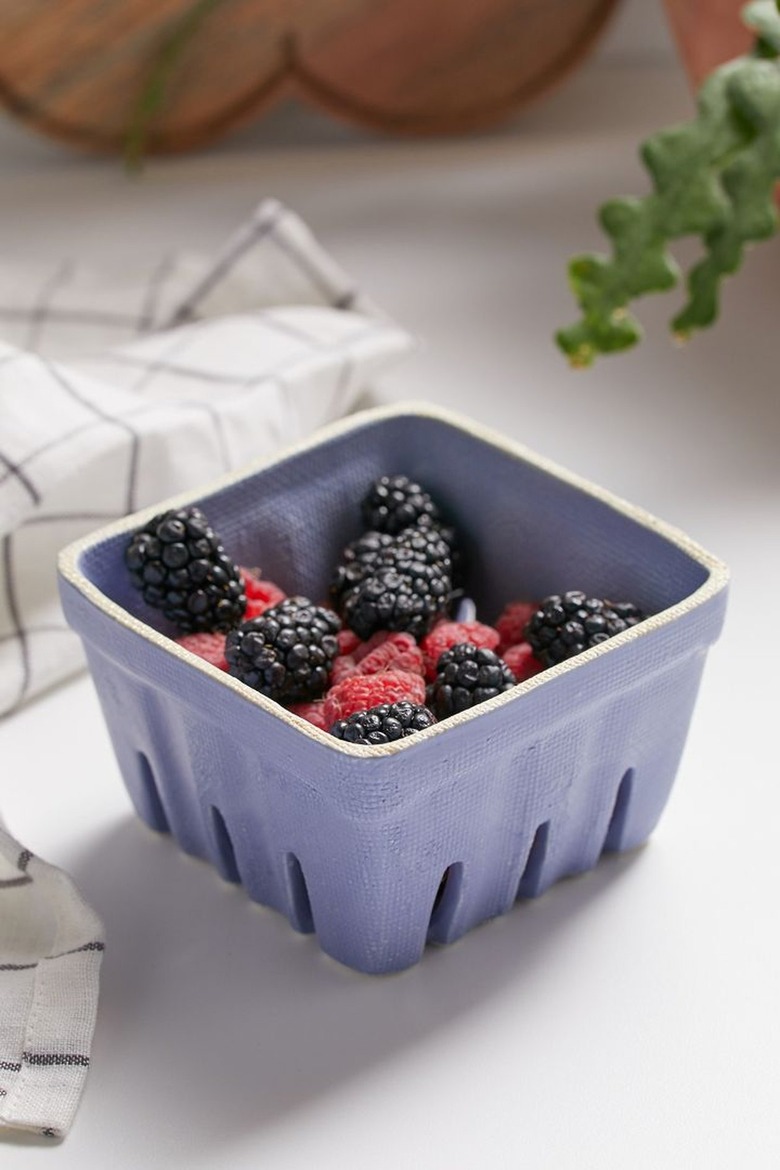 berries in ceramic colander