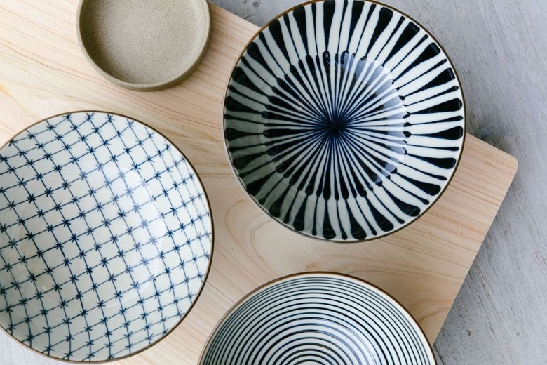 overhead view of dishes in various patterns and colors