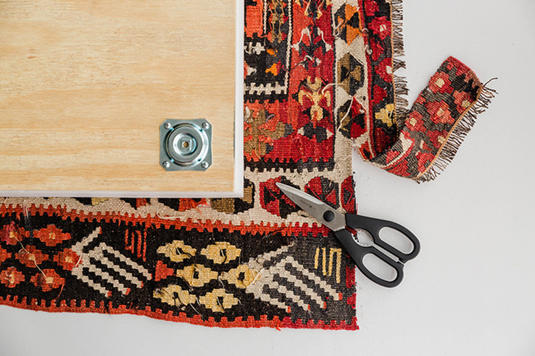 Cut the vintage rug to size.