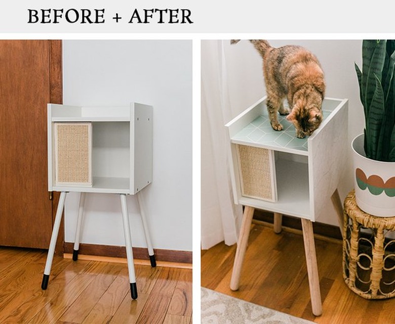 IKEA Lurvig cat house makeover using wood legs and removable wallpaper.