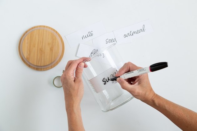 Add hand-lettered labels to IKEA 365+ glass jars.