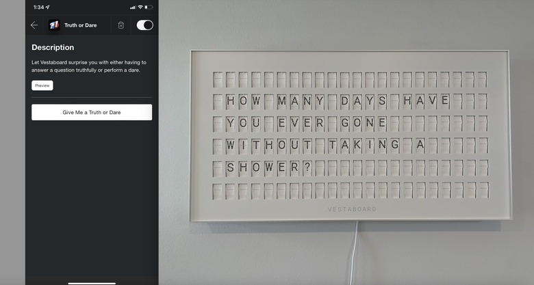 white vestaboard on wall