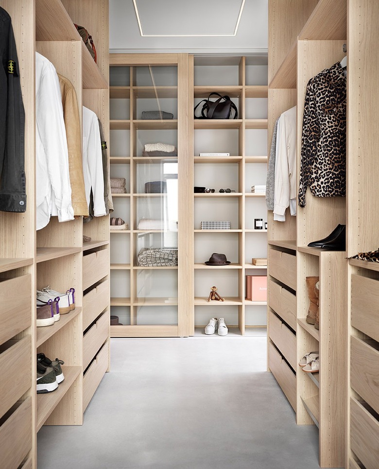 walk-in closet with clothing