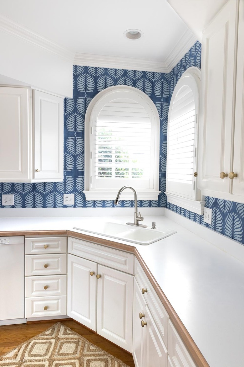 white kitchen with blue boho botanical wallpaper splash back