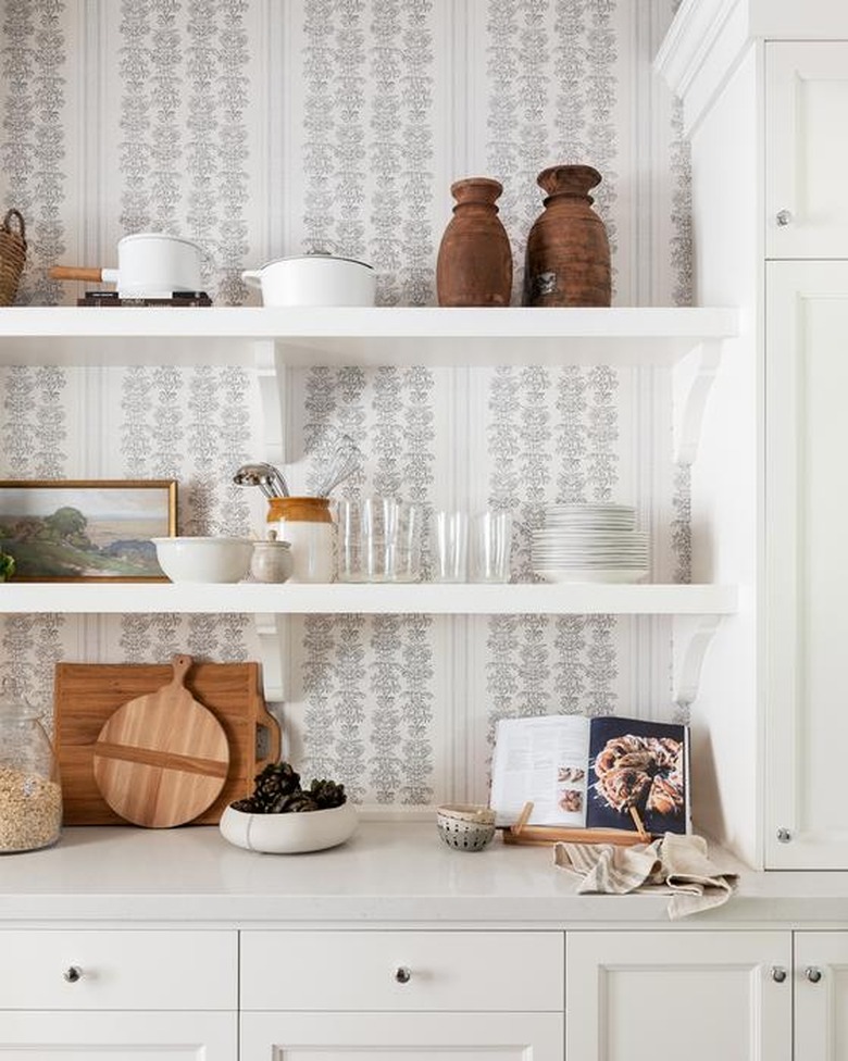 dainty floral backsplash with open shelving