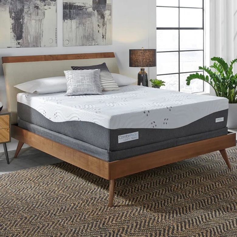 mattress on midcentury modern wood bed frame