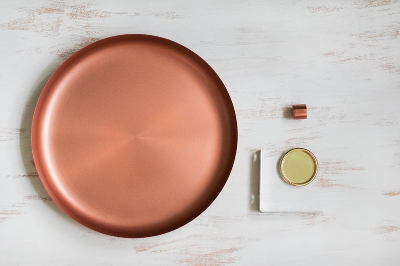 Round metal plate with cup pull