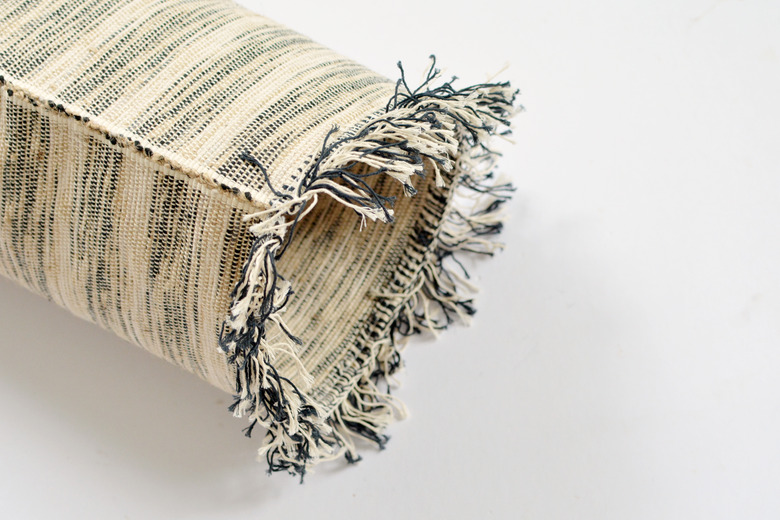 Turn Rugs Into Bench Pillows