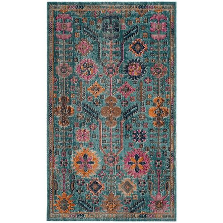 Colorful teal rug for bohemian living room