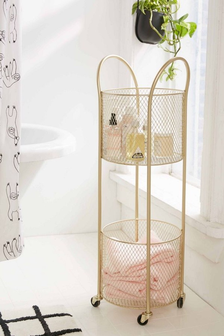 small bathroom storage ideas with rollable gold metal storage cart
