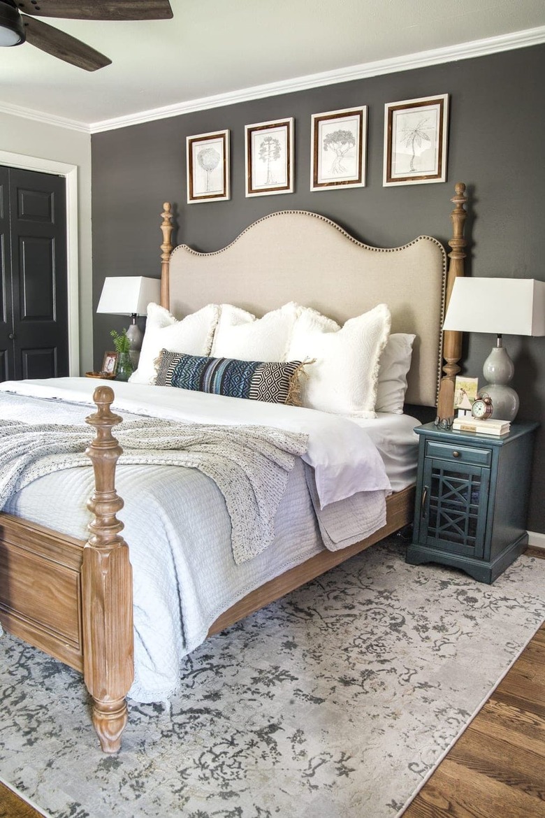 oak bedframe in gray bedroom