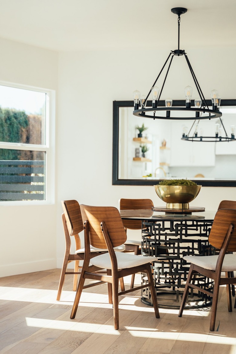 Dining room with wood modernist chairs