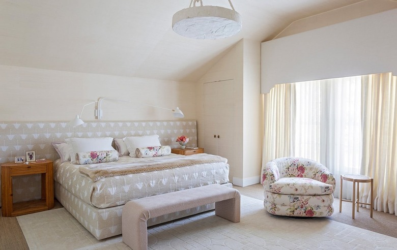 bedroom with ivory walls and beige furniture