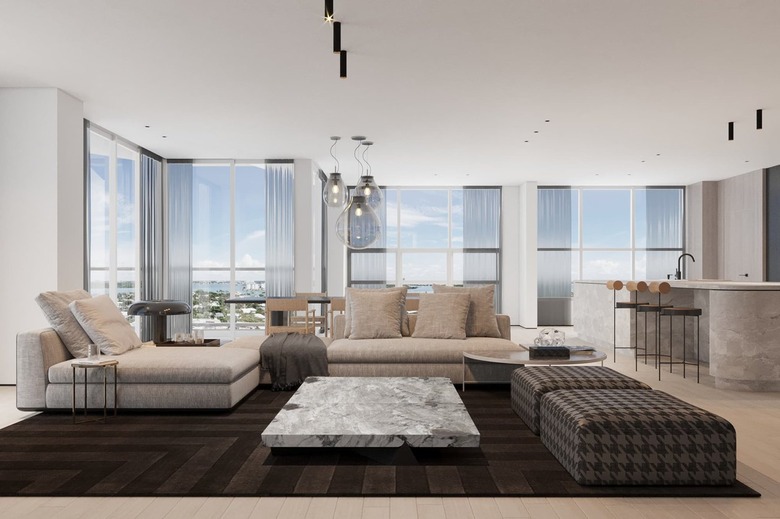 Black rug with gray couch