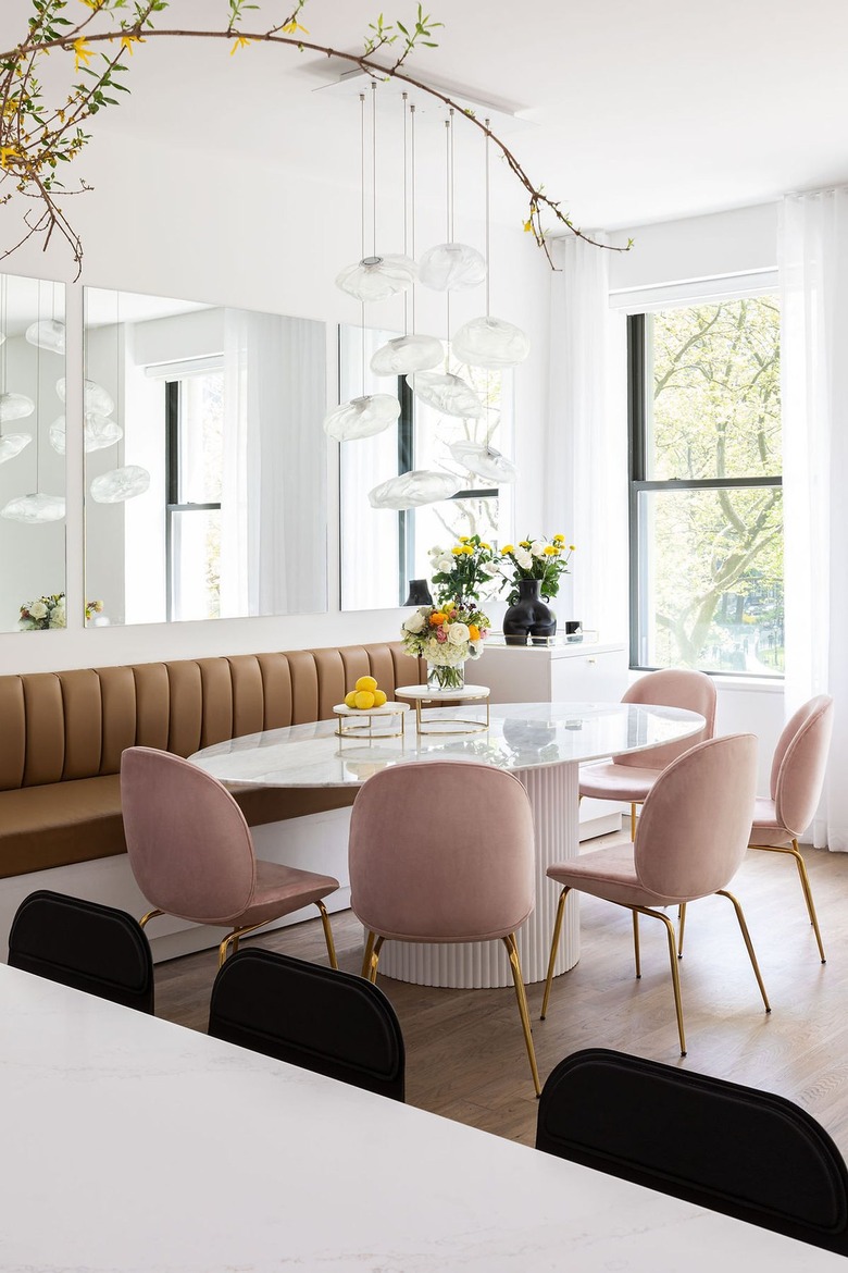 dining room with blush chairs