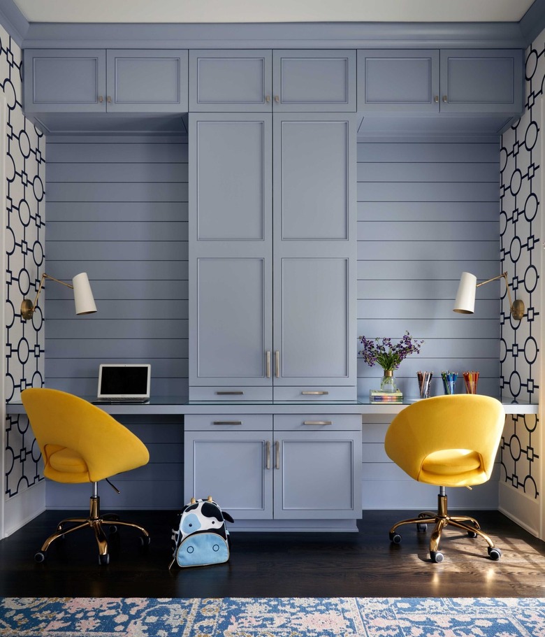 office with periwinkle blue cabinets and paneling