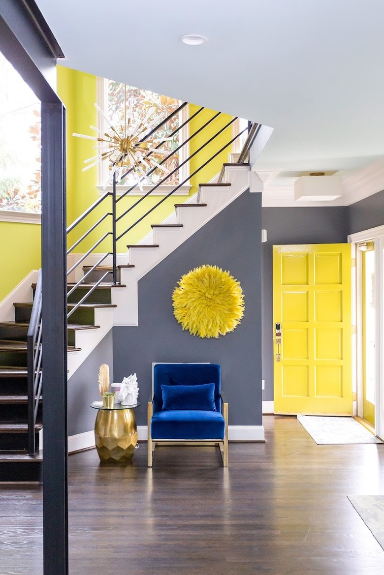 Foyer painted in charcoal and yellow
