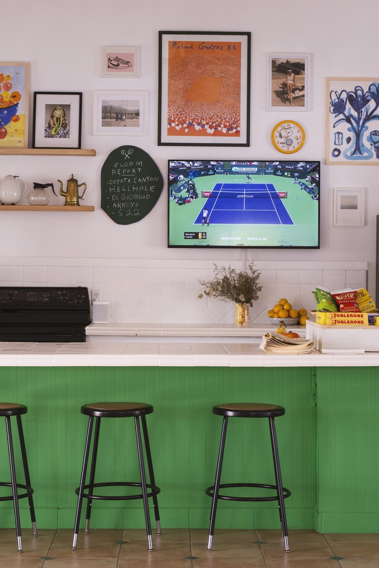 Kitchen bar setup with green tiled sides