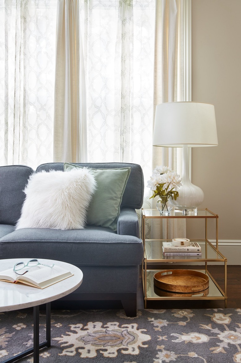 Blue and beige living room by Sarah Cole Interiors