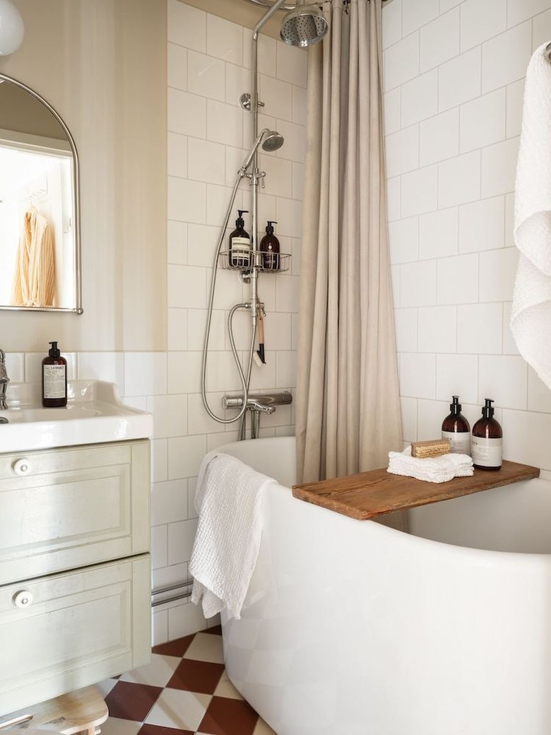 Vintage-inspired bathroom with beige and sage