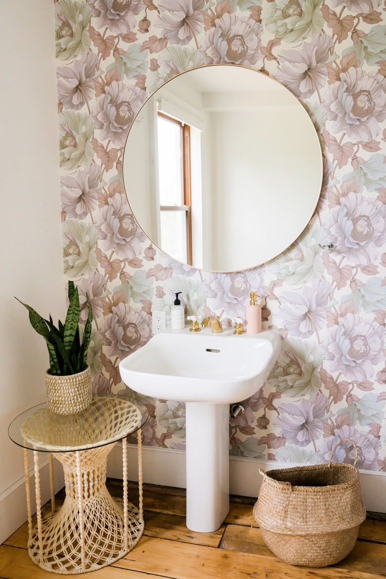 a bathroom with a pedestal sink