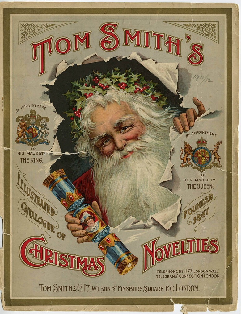 A vintage poster of Santa holding a Christmas cracker.