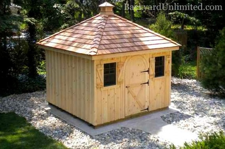 Shed with hipped roof.