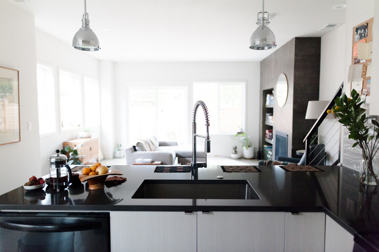 kitchen with black stone countertops