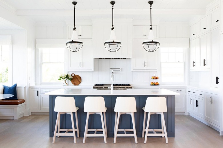 White kitchen with gray island