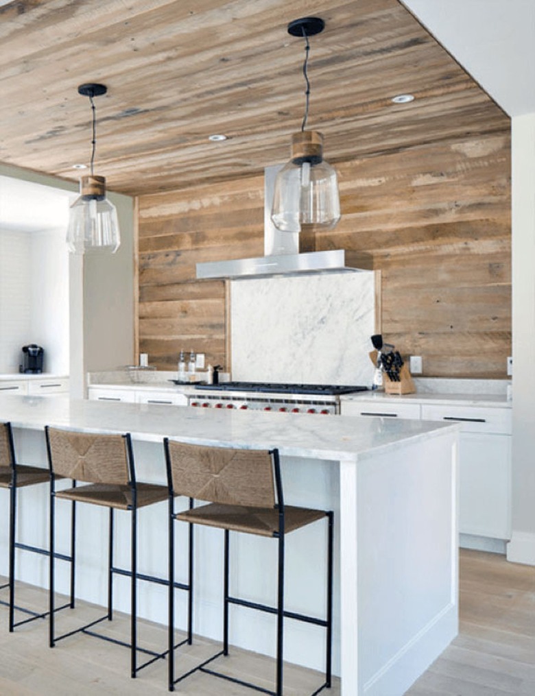 Kitchen with reclaimed wood backsplash and ceiling