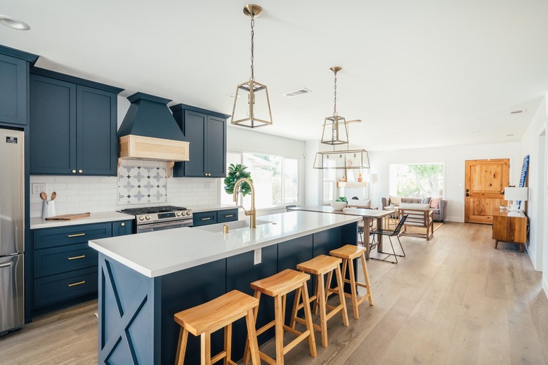 Kitchen with dark blue cabinets