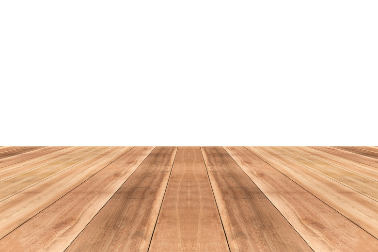 Wooden table top against white background