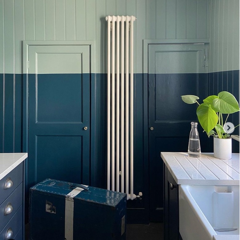 farmhouse kitchen with blue and mint green walls