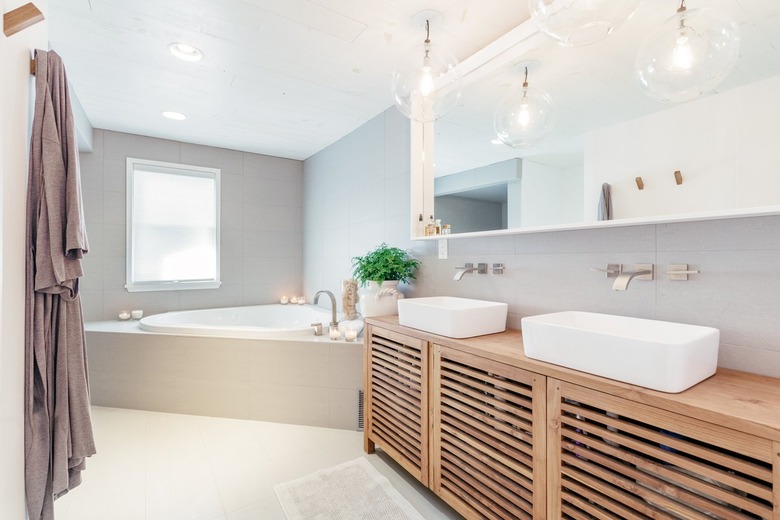 a large bathroom with a raised spa tub