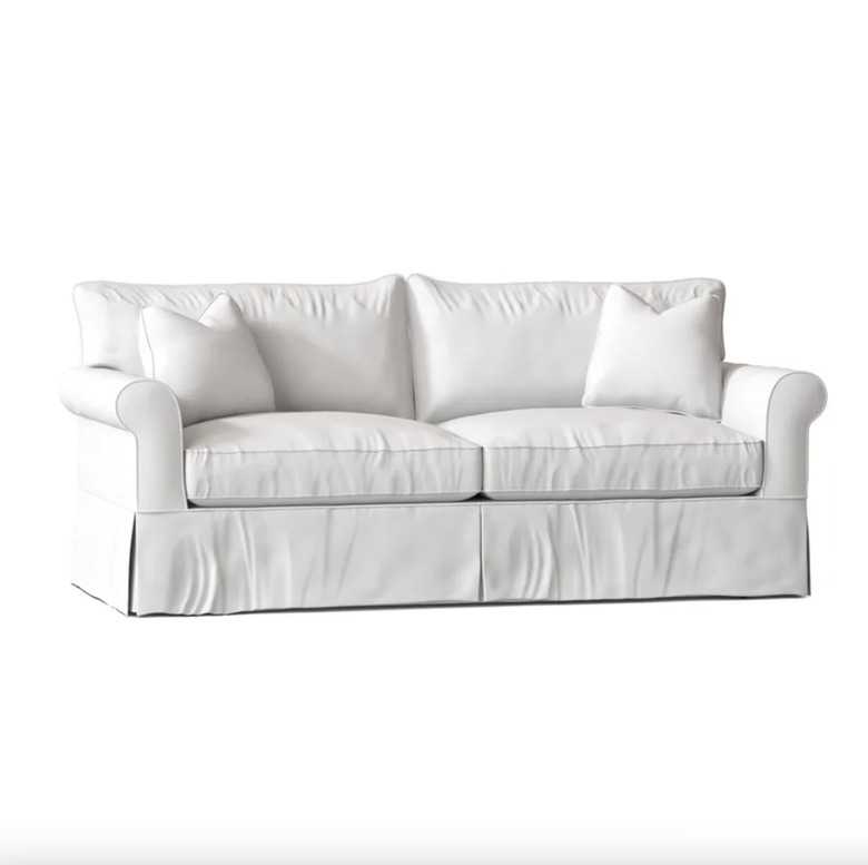 Joss and Main Amari Slipcovered Loveseat in white against a white backdrop