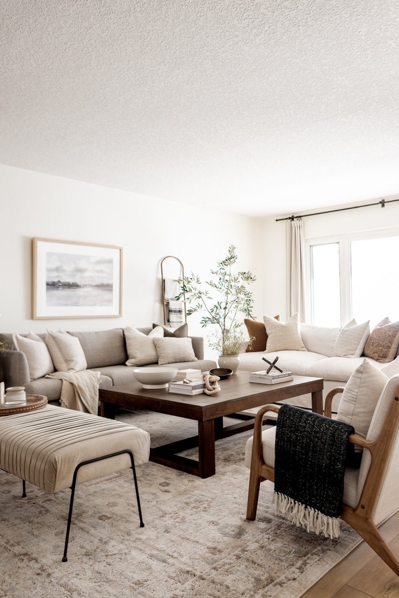 white living room with wood finishes