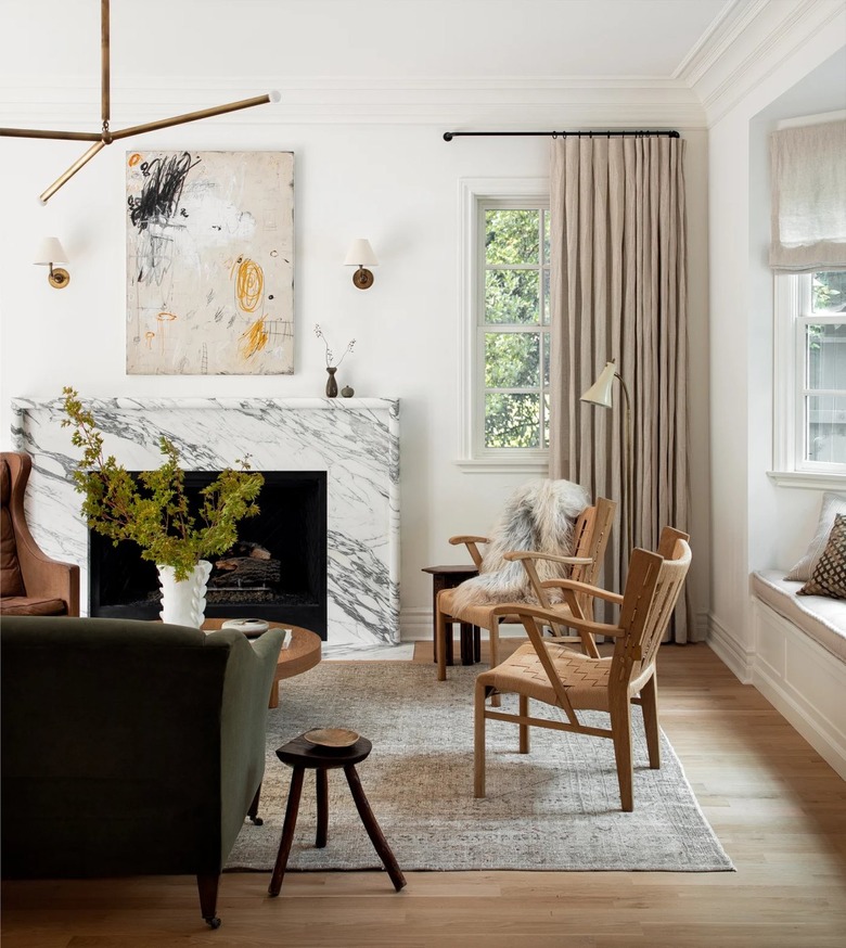white contemporary living room with modern light fixture