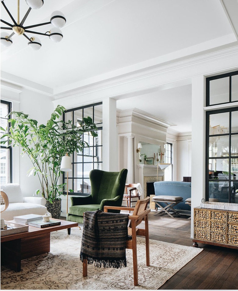 white living room with a pair of interior windows